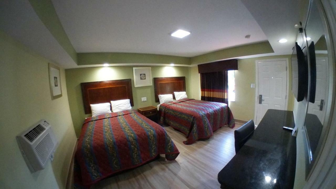 Travel Inn Of Ривиера Бийч Екстериор снимка